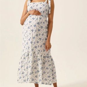 New with tags! Soft double-face maxi gauze dress with ruffled hem. Unlined.